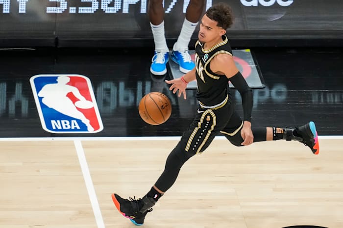 Atlanta Hawks guard Trae Young (11) dribbles the ball against the New York Knicks during the first half in game four in the first round of the 2021 NBA Playoffs at State Farm Arena.